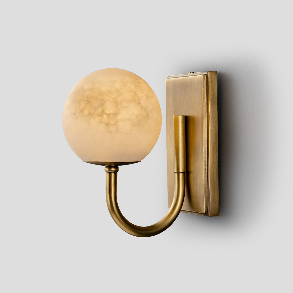 Modern Brass Curved Arm Sconce 1 Modern Brass Curved Arm Sconce