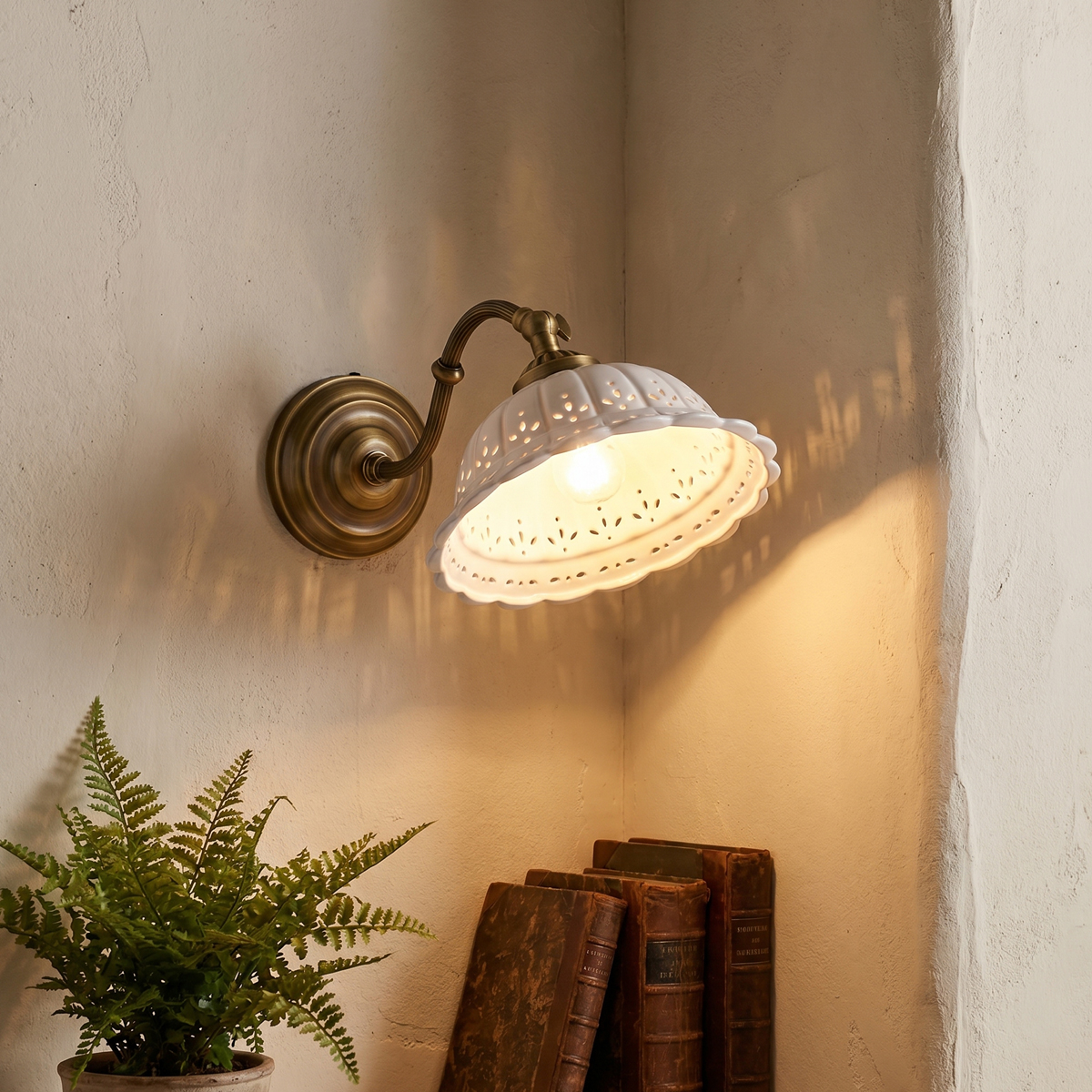 French Country Wall Sconce 2 French Country Wall Sconce with antique brass arm and scalloped pierced ceramic shade